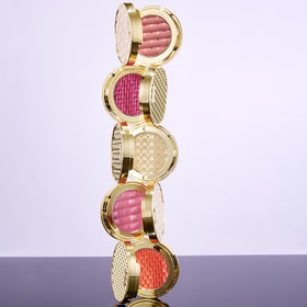 tarte compacts inside a clutch illustrating travel-friendly size and convenience