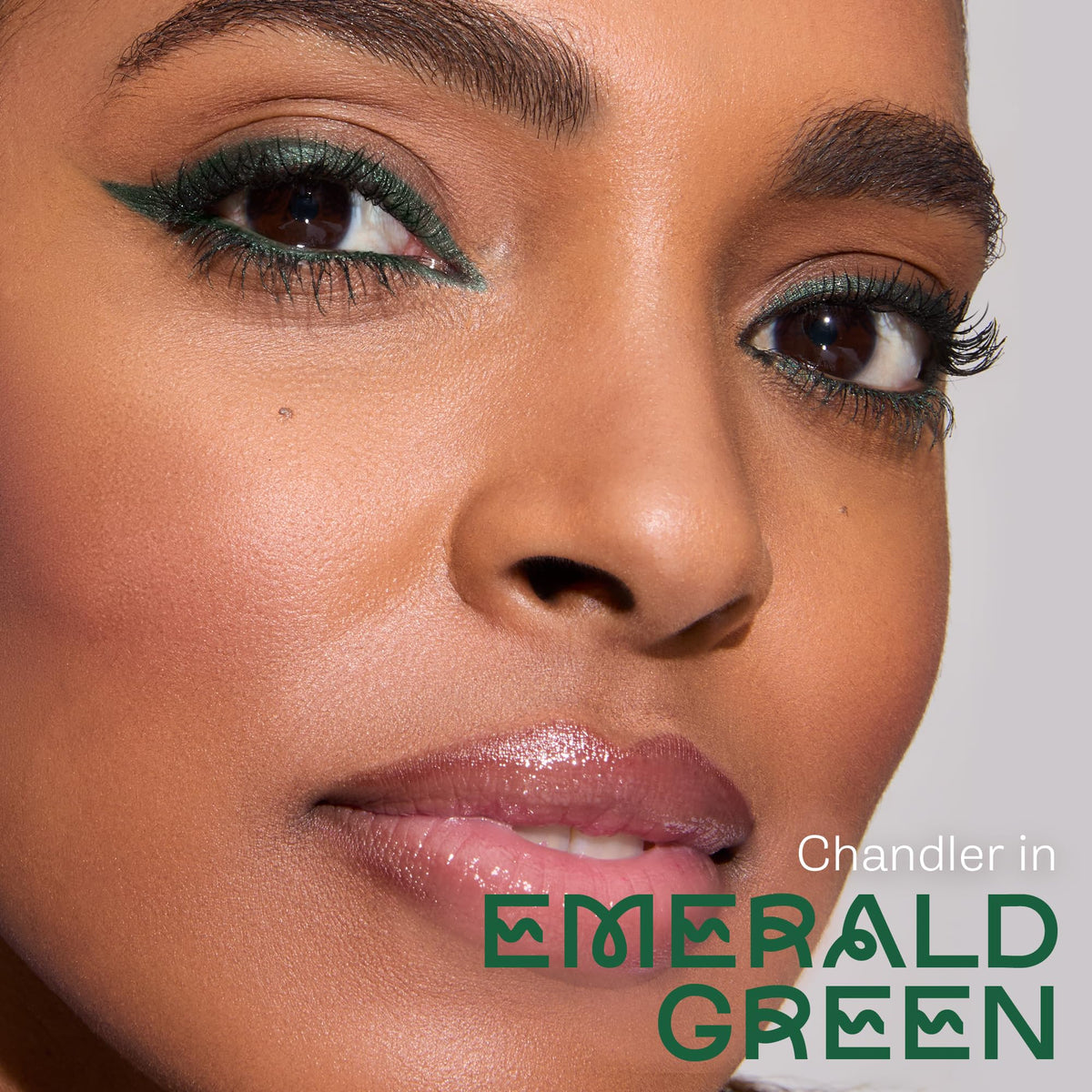 tarte tartelette emerald green swatch on skin showing vibrant pigment