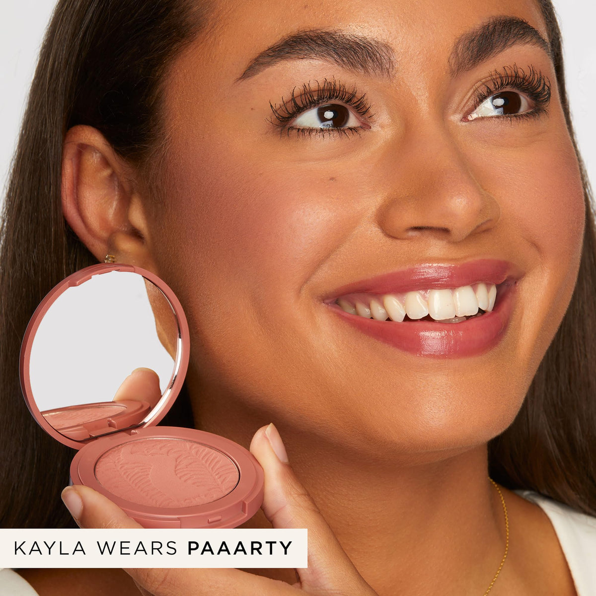 tarte texture finish detail of powder surface, reveals silky, finely milled texture