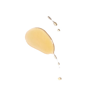 Tata Harper dropper dispensing oil highlighting control and precise application benefit