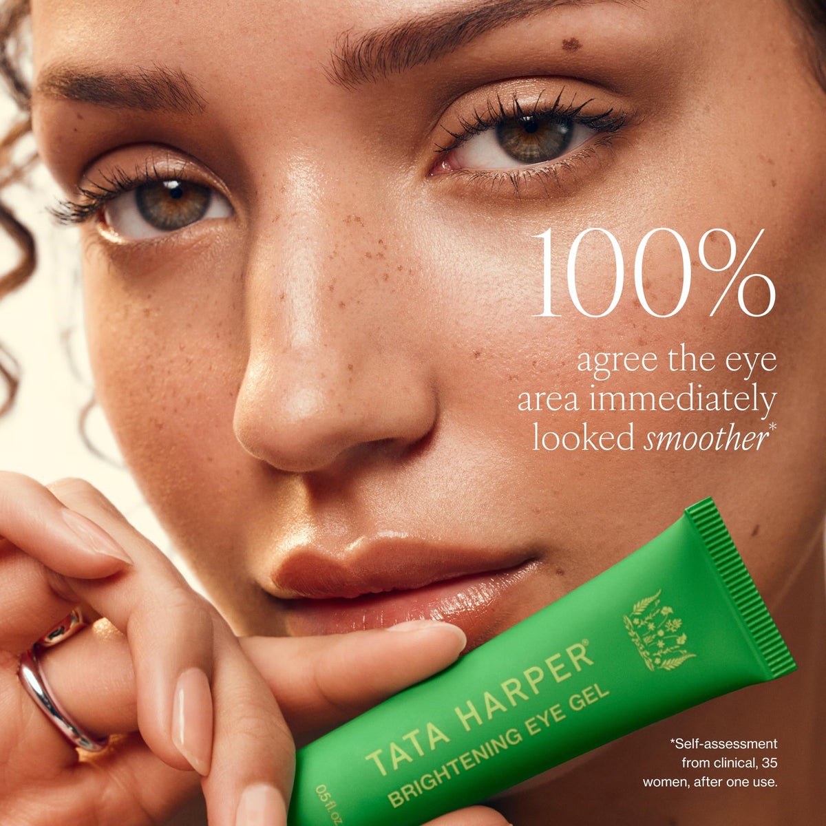 Tata Harper applying gel under eye to reduce puffiness and refresh look