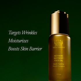Tata Harper oil texture on hand showing absorbency and lightweight finish benefit