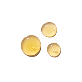 Tata Harper close-up of dispensed oil texture highlighting nourishing glide and easy spread