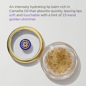 TATCHA open tube texture displaying creamy balm and gold flecks for nourishing shine