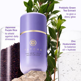 TATCHA jar beside everyday items showing compact travel-friendly size