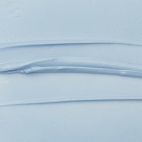 tatcha indigo hand cream applied on hand demonstrating calming finish