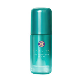 TATCHA bottle front packaging showing elegant serum design and brand benefit