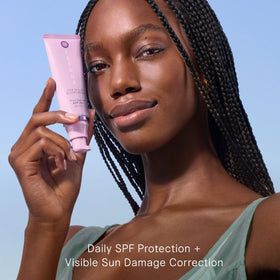 TATCHA sunscreen being dispensed from pump for easy, controlled application