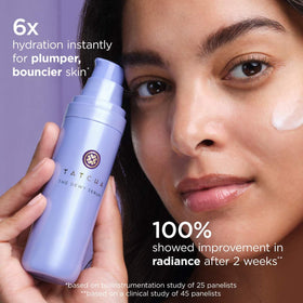 TATCHA travel size products next to coin for scale, ideal for travel
