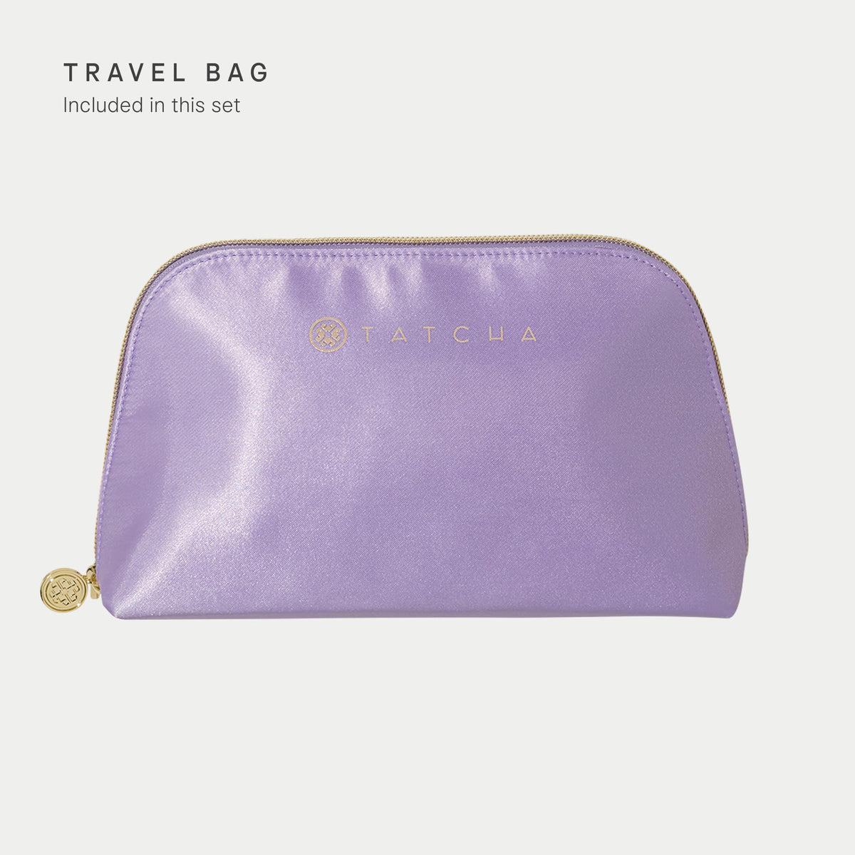 TATCHA minis next to a credit card showing compact size and travel readiness
