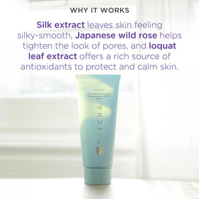 TATCHA sunscreen held in hand for size reference, shows travel-friendly 60 ml