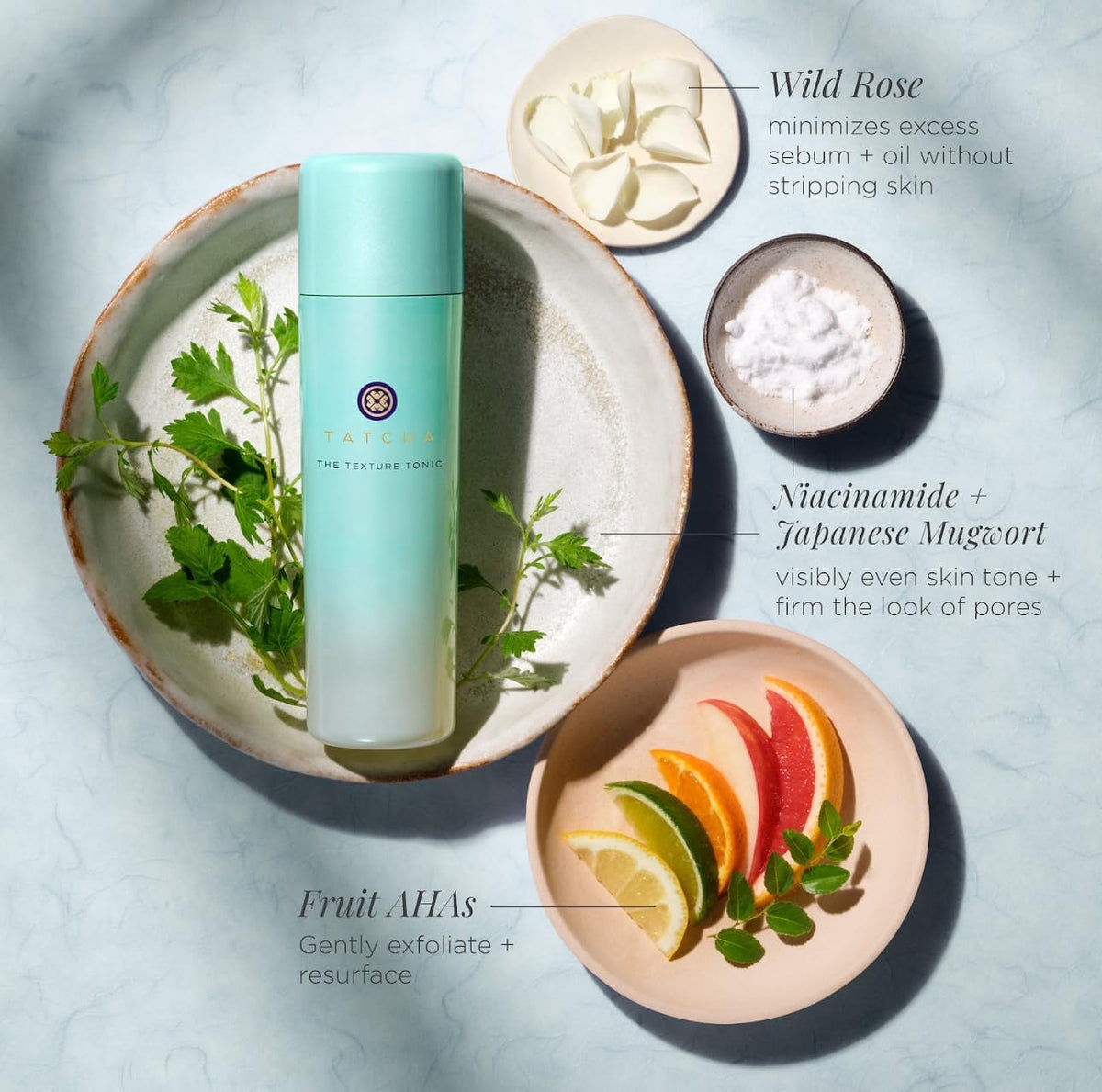 TATCHA tonic on bathroom vanity in routine setting for lifestyle appeal