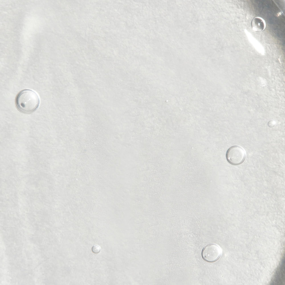 Tea Tree gel being applied to hair demonstrating firm hold benefit