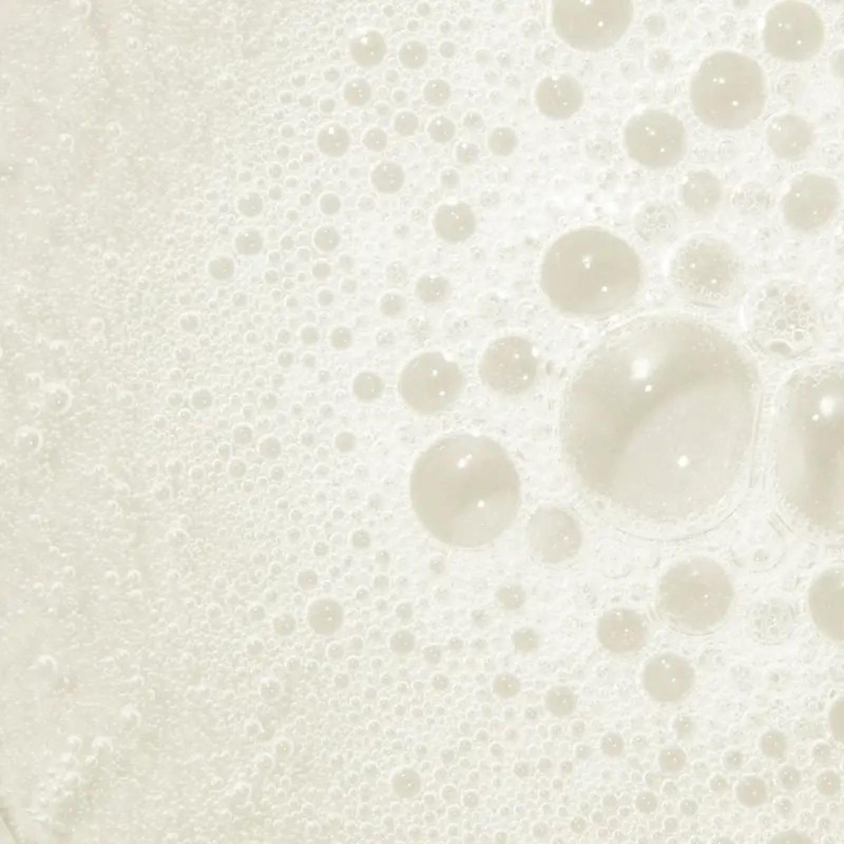 Tea Tree creamy foam texture highlighting gentle, sulfate-free cleanse