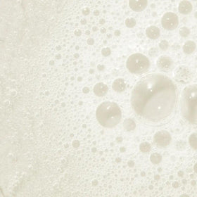 Tea Tree creamy foam texture highlighting gentle, sulfate-free cleanse