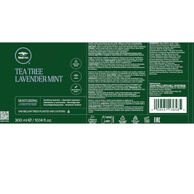 Tea Tree in bathroom lifestyle showing leave-in spray in use, easy styling benefit