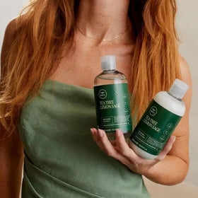 Tea Tree dispensed into palm demonstrating controlled application benefit