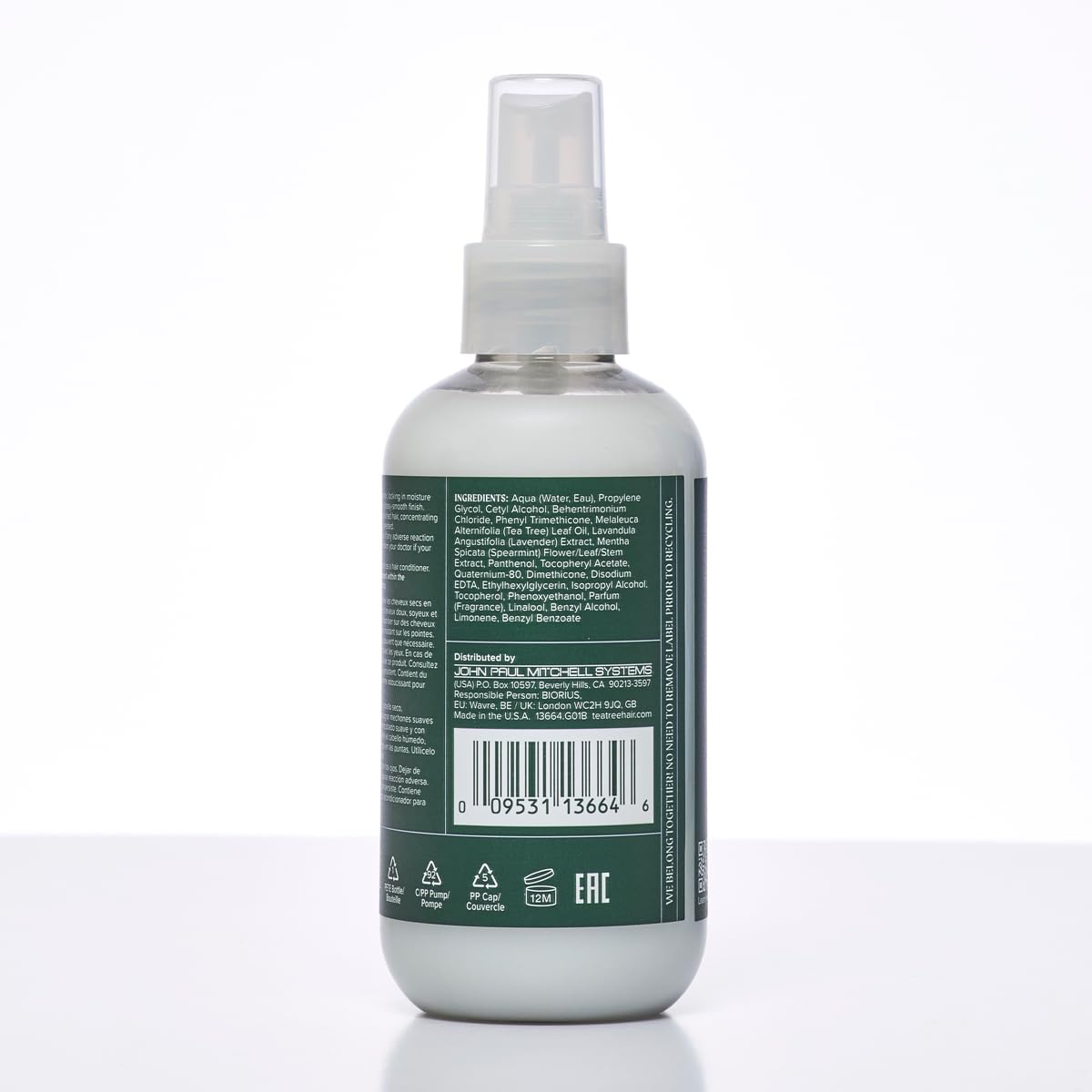 Tea Tree bottle beside everyday items showing 6.8 fl oz scale and travel-friendly benefit