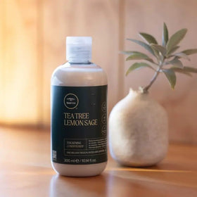 Tea Tree lemon and sage ingredient display highlighting refreshing botanical scent