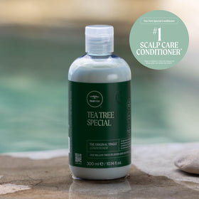 Tea Tree on a bathroom shelf lifestyle image conveying salon scent and daily ritual