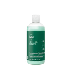 Tea Tree front bottle showing product and refreshed hair benefit