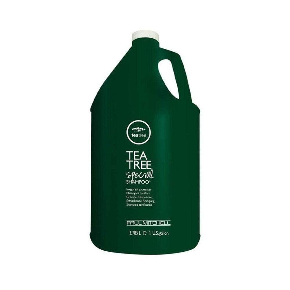 Tea Tree shampoo pouring from bottle highlighting creamy texture and lather benefit