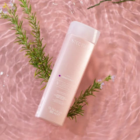 TEC Lumina conditioner being applied to hair for detangling and softness benefit