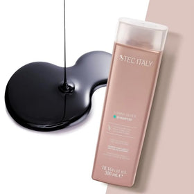 TEC Lumina shampoo in hand demonstrating lather and gentle cleansing benefit