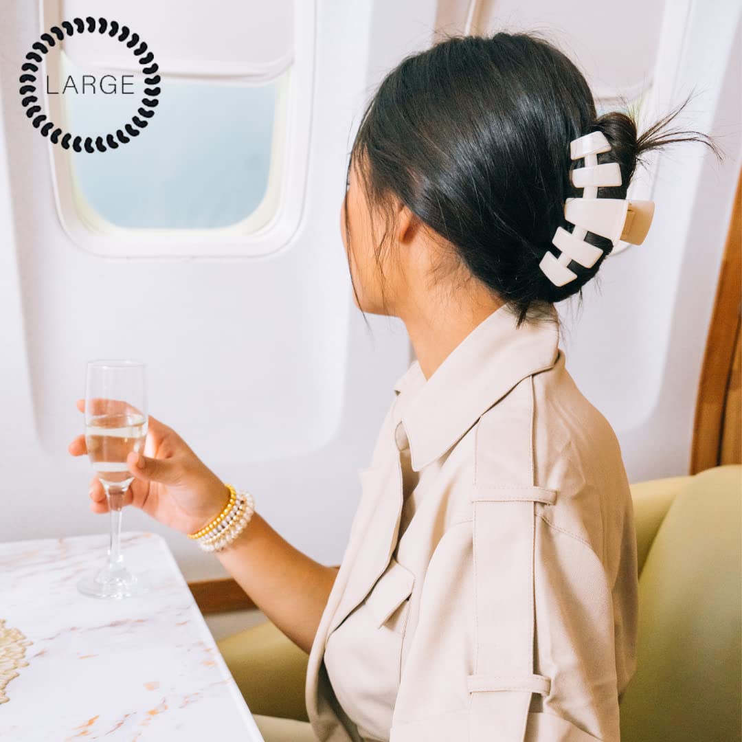 Teleties clip securing a bun to show comfortable, all-day wear