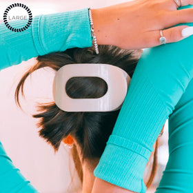 TELETIES large clip worn during yoga demonstrating stable, no-slip grip
