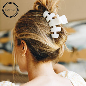 Teleties clip beside ruler showing large size and coverage for voluminous hair