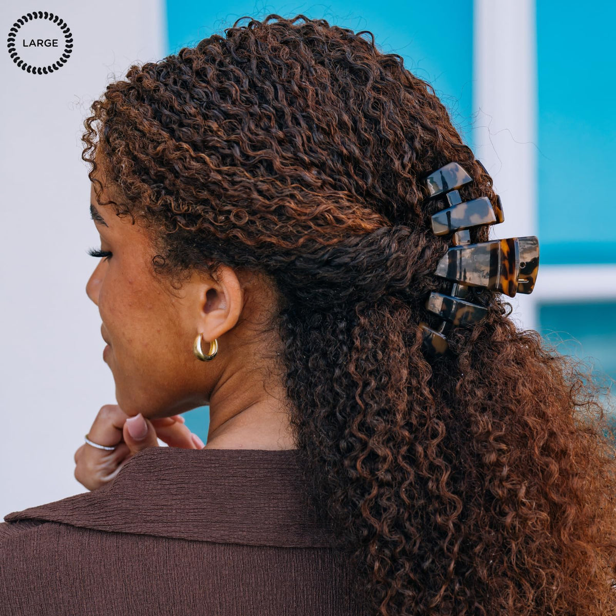 Teleties clip in hair updo demonstrating strong hold for thick hair