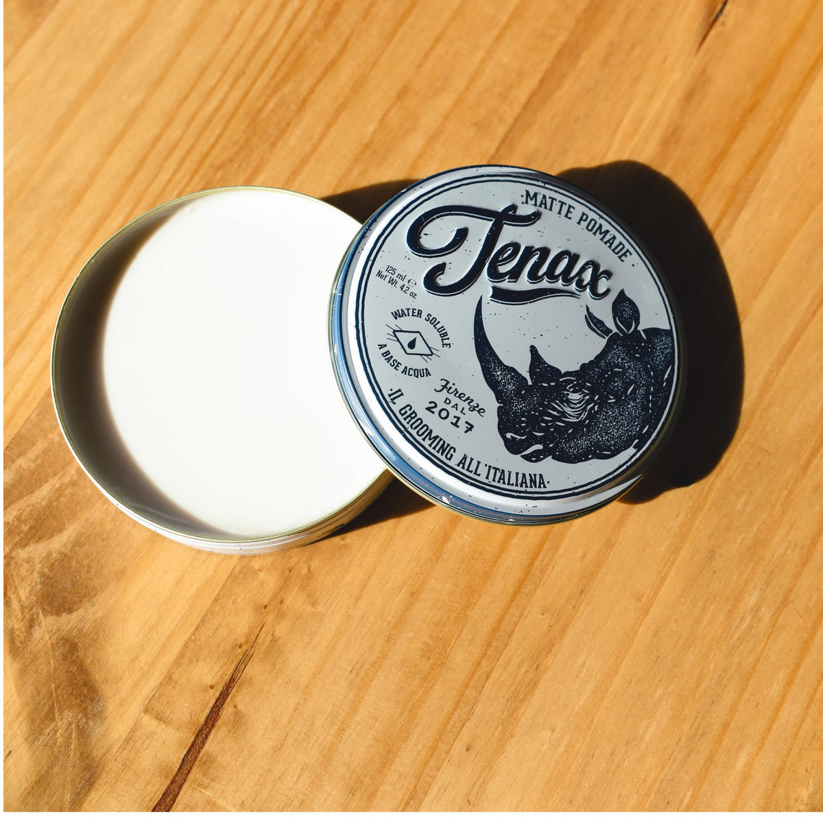 Tenax jar beside a ruler to show 4.2 ounce size for travel and everyday use
