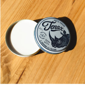 Tenax jar beside a ruler to show 4.2 ounce size for travel and everyday use
