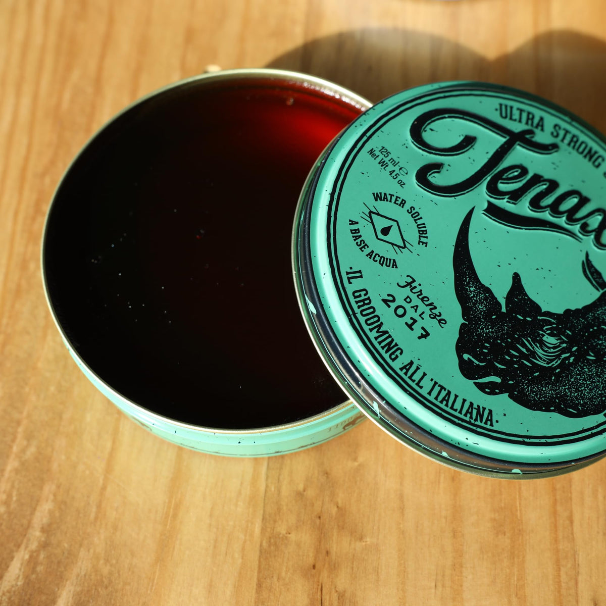 Tenax styled pompadour lifestyle photo showcasing high-shine finish