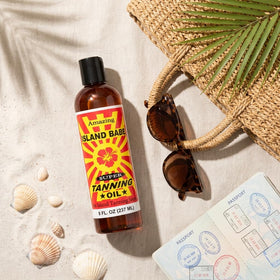 Texas Babe oil poured on hand highlighting lightweight texture and fast absorption