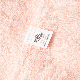 Textila turban displayed on bathroom shelf showing organized storage and quick access