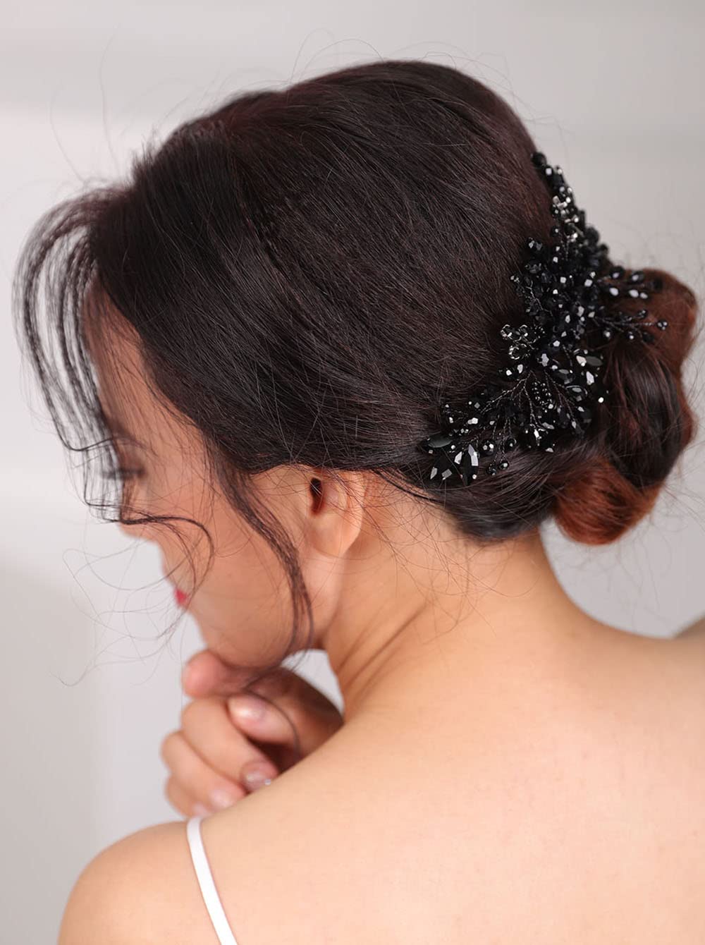 Teyglen comb styled in hair side profile demonstrating secure hold and flattering placement