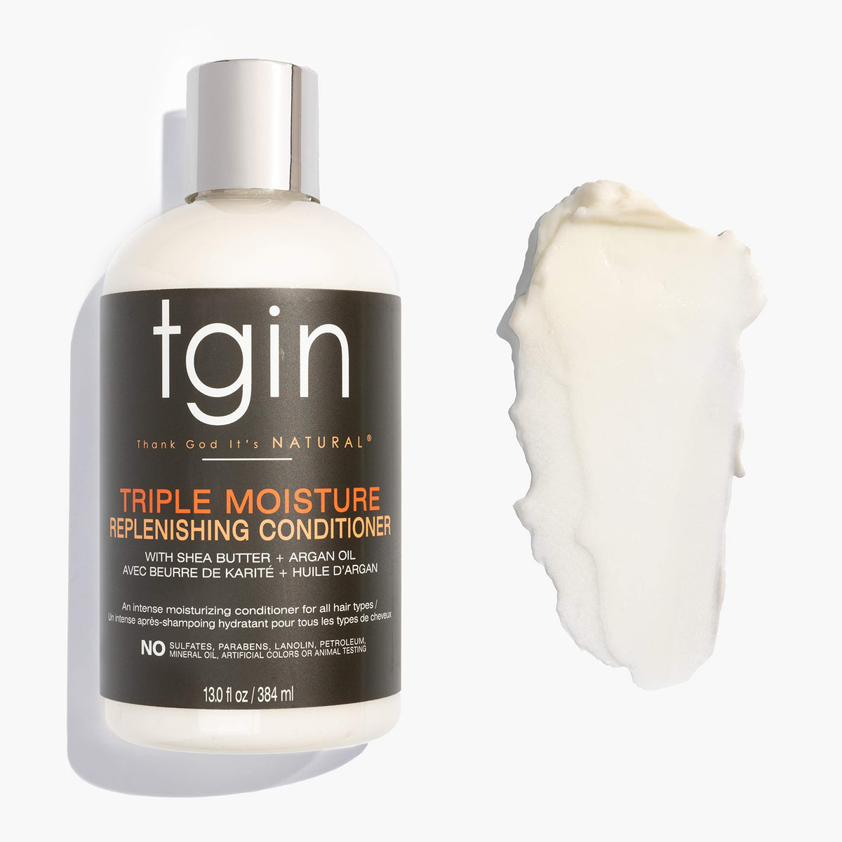 Thank God It's Natural conditioner texture in jar highlighting creamy moisture