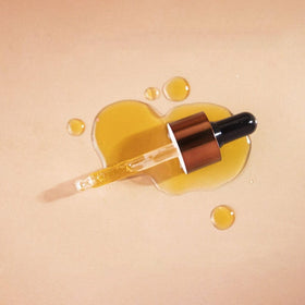The Ayurveda Experience hand demonstration applying serum with 6-fingertip technique benefit