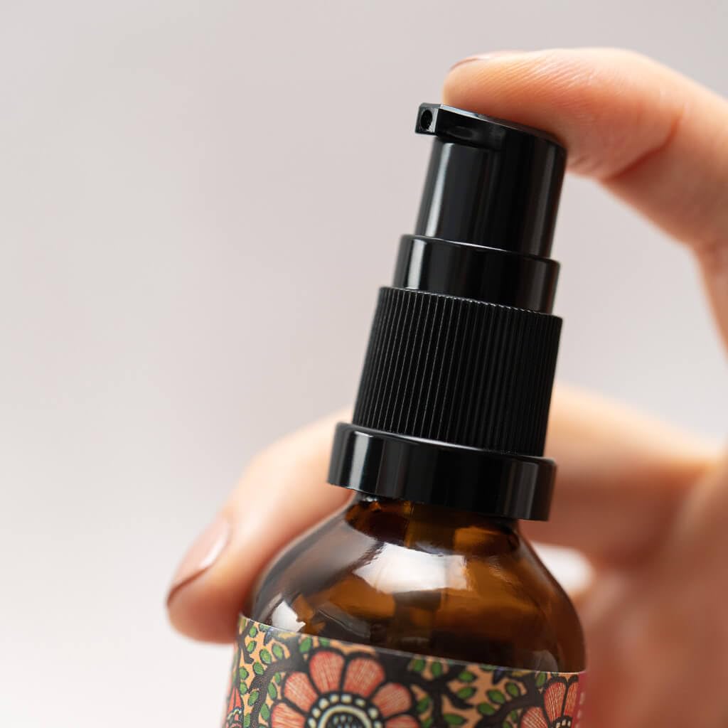 The Ayurveda Experience Yauvari 50 ml bottle next to ruler showing size and travel convenience