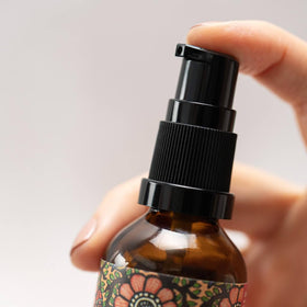 The Ayurveda Experience Yauvari 50 ml bottle next to ruler showing size and travel convenience