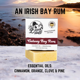 The Black Stuff citrus cedarwood soap lathered in hand demonstrating creamy moisturizing foam