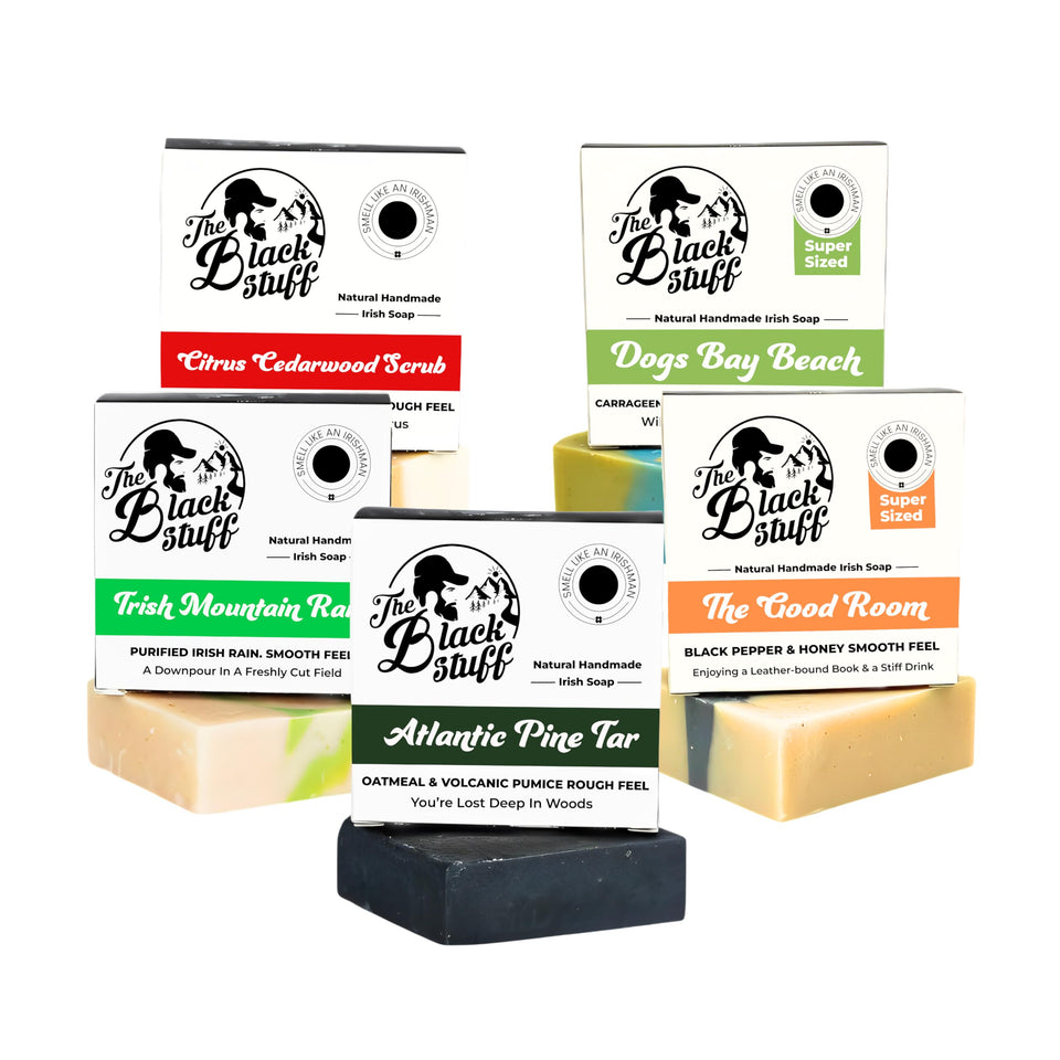 The Black Stuff front packaging showing five assorted handmade bars for versatile grooming
