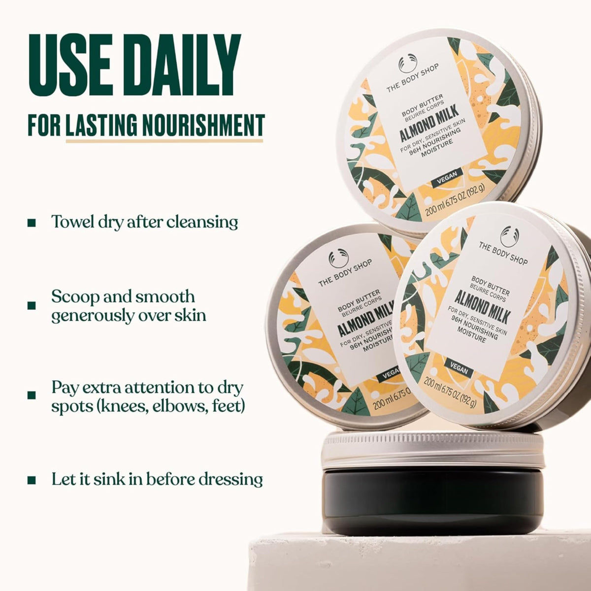 The Body Shop almond milk body butter on bathroom shelf for daily skincare ritual