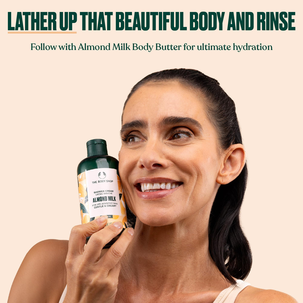 The Body Shop bottle on bathroom shelf with towel illustrating daily ritual and calming, cozy bath setup