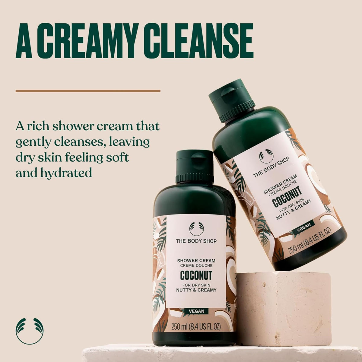 The Body Shop coconut shower cream pump closeup showing easy dispensing convenience