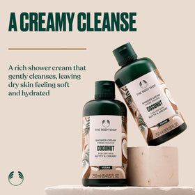 The Body Shop coconut shower cream pump closeup showing easy dispensing convenience