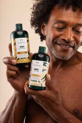 Application of The Body Shop ginger conditioner on wet hair demonstrating even coverage and improved detangling