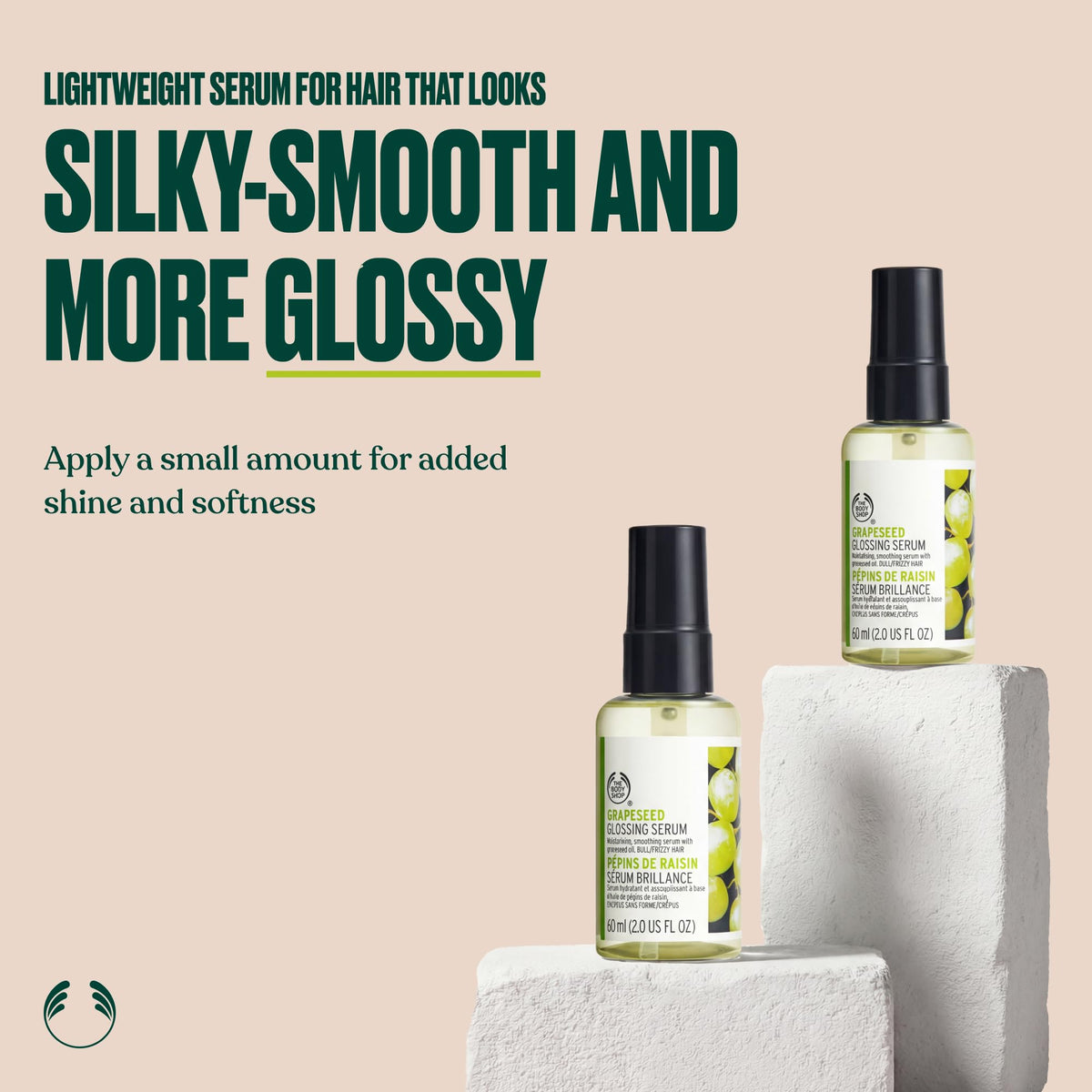 The Body Shop grapeseed serum dropper dispensing a droplet for controlled application and minimal waste